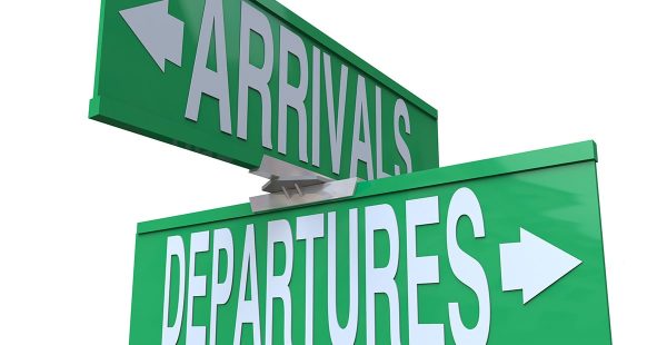 Photo of sign with arrivals and departures