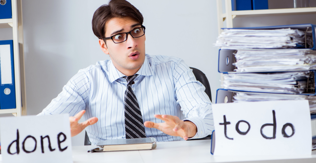 Man with full to do list