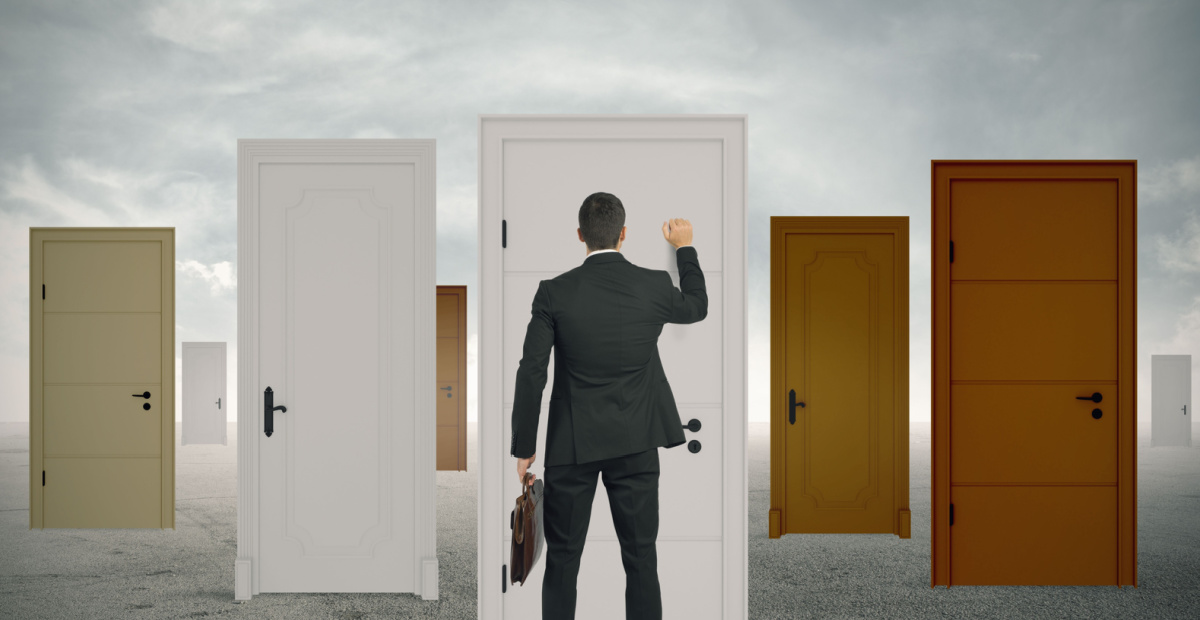 Businessman knocks on doors