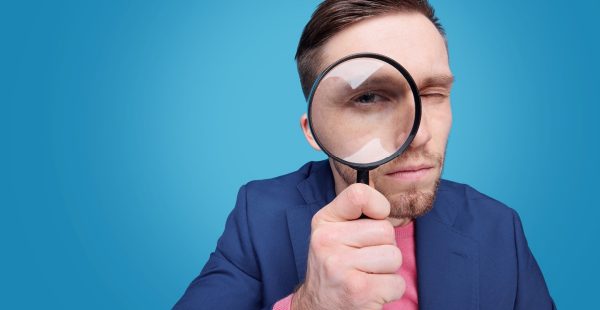 Man with magnifying glass