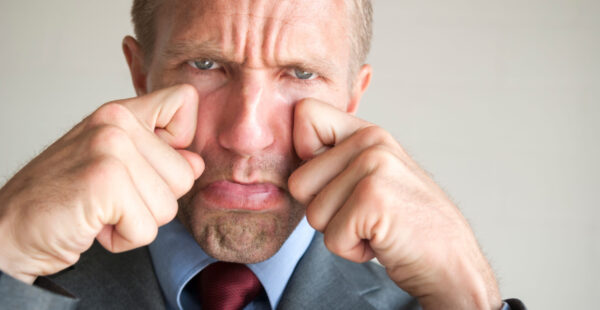 Businessman's crocodile tears