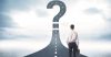 Man on road to question mark