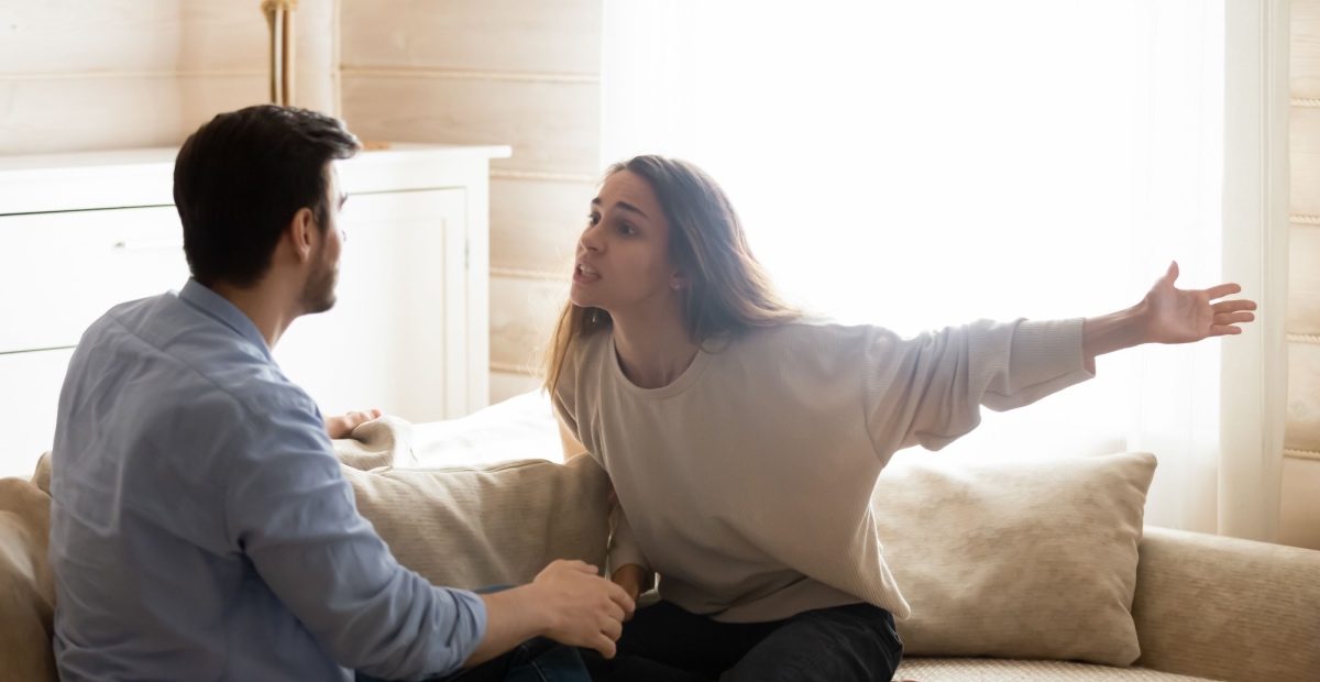 Young woman argues with man