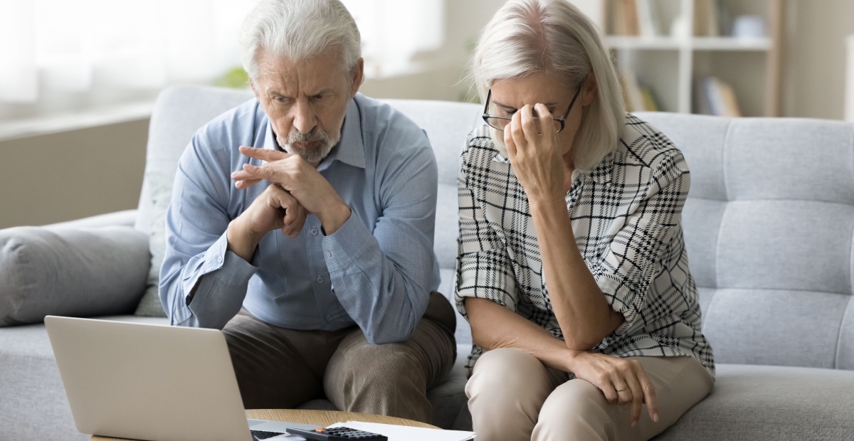 Worried retired couple