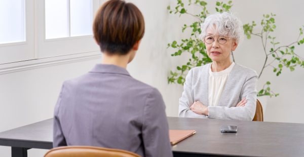 Older woman being told