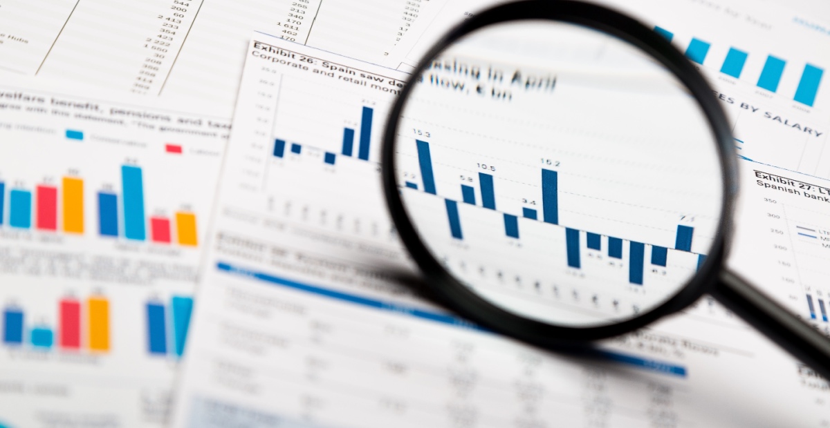 Magnifying glass and chart