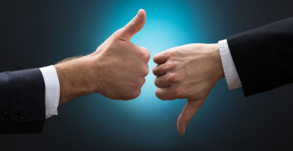 Male hands - thumbs up thumbs down