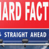 "Hard facts straight ahead" sign