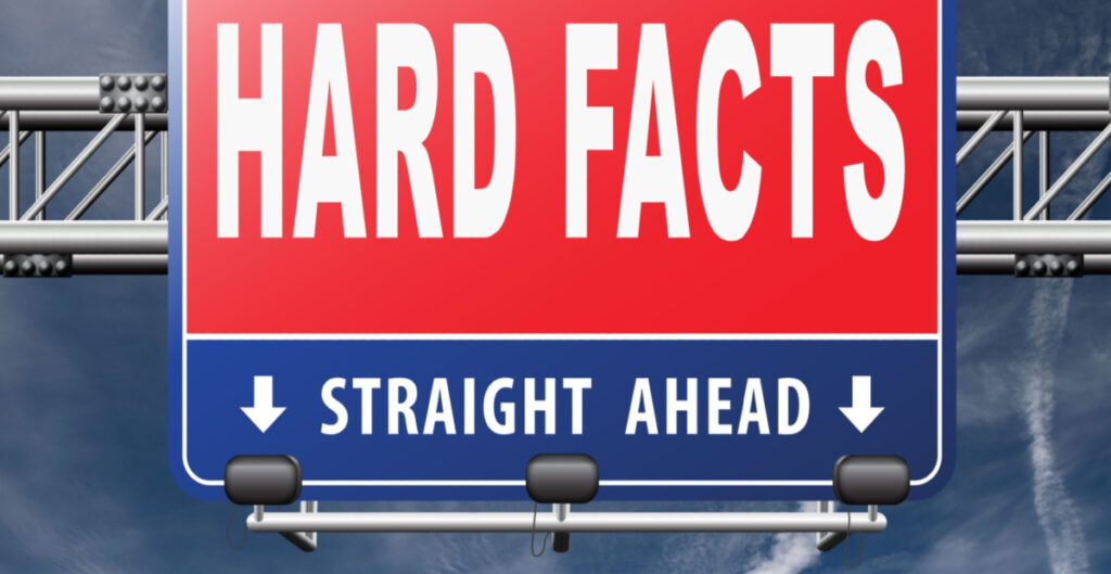 "Hard facts straight ahead" sign