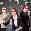 blindfolded people chase money
