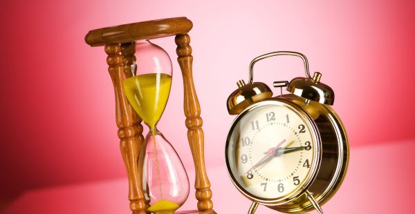 Hourglass and alarm clock