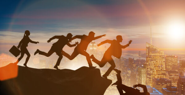 Figures running over a cliff