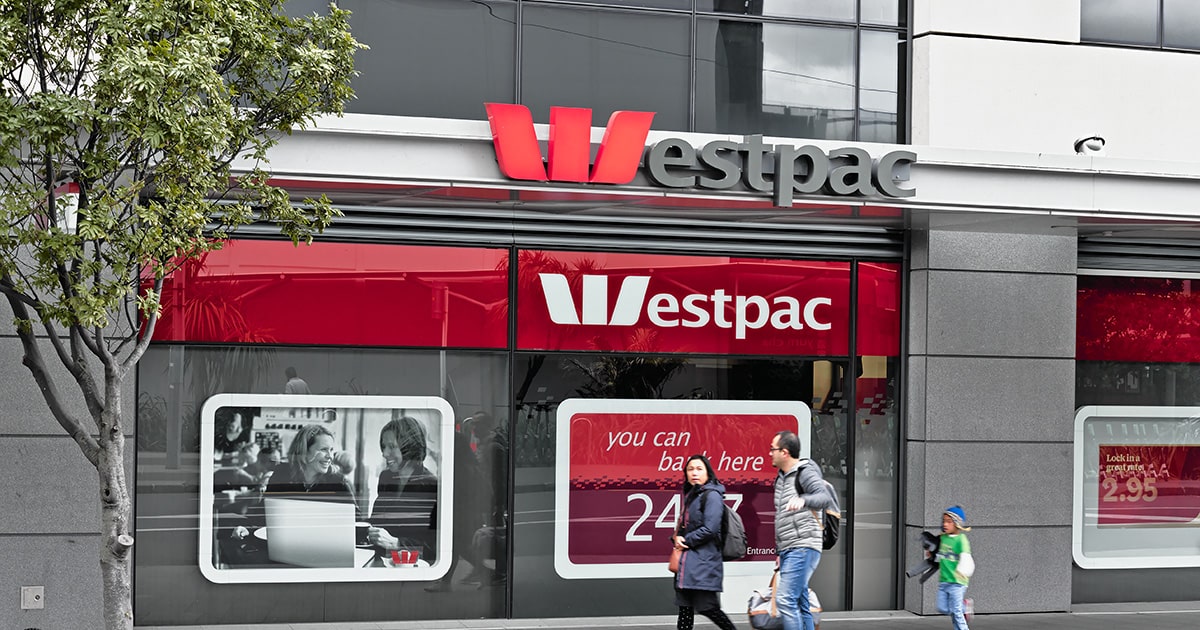 Westpac branch with family walking past