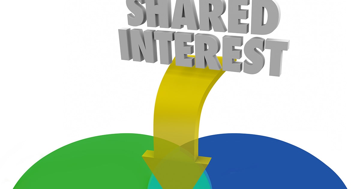 Shared interest wording pointing at green and blue circles