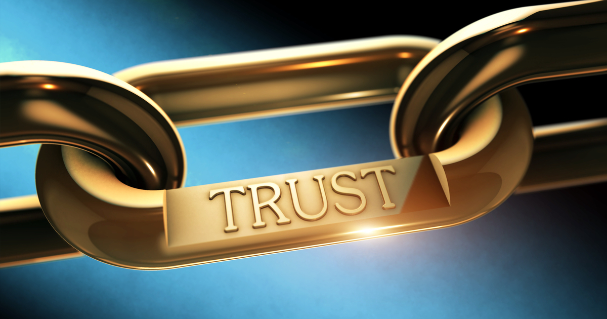 Gold link with Trust written