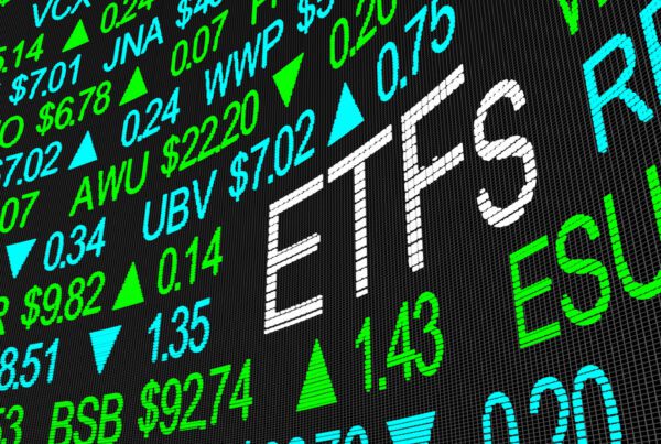 Stocks board with the word ETFs in white