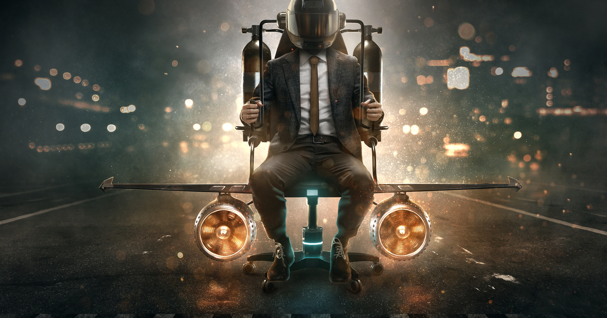 Businessman in rocket chair