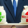 Scale with man holding bags with Invest and Withdraw written