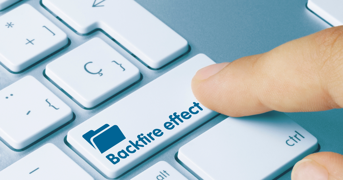 Finger pressing keyboard button with Backfire effect written
