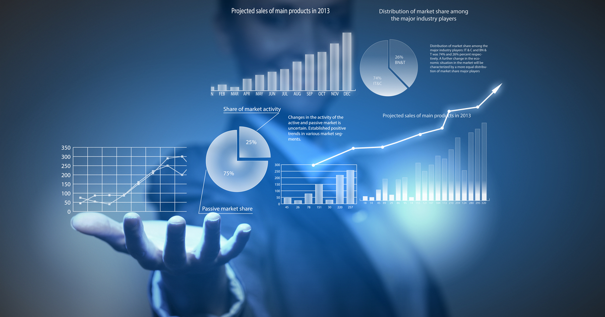 Image of man holding up superimposed charts and graphs