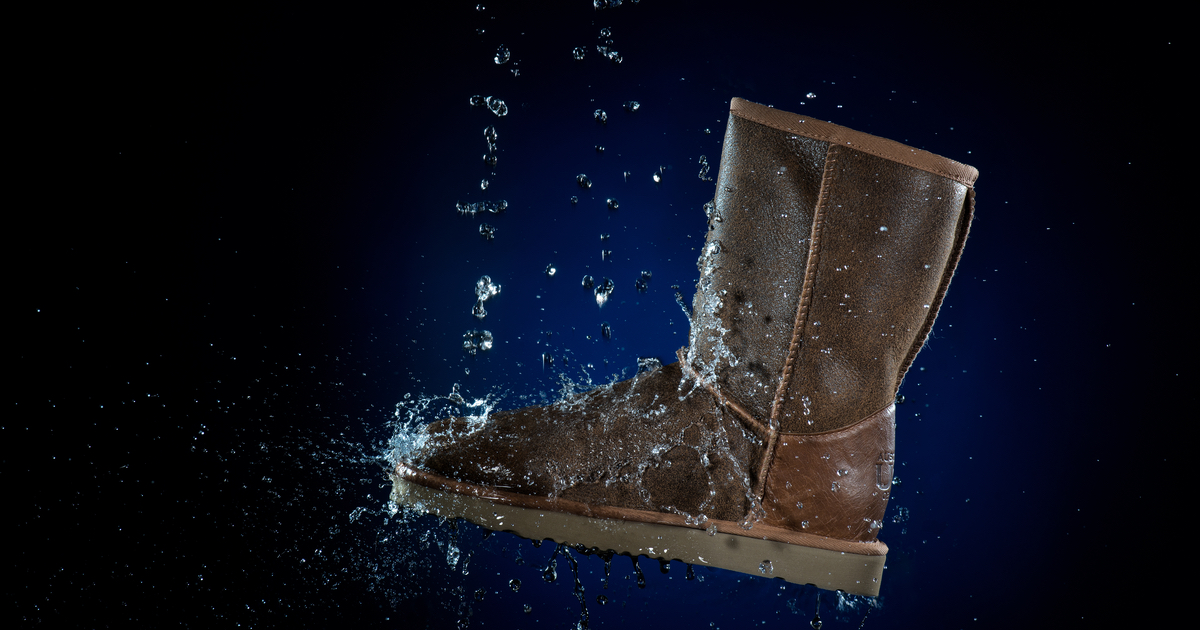 Ugg Boot kicking water