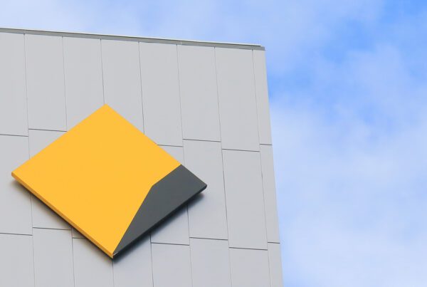 Commonwealth Bank logo on the side of a building